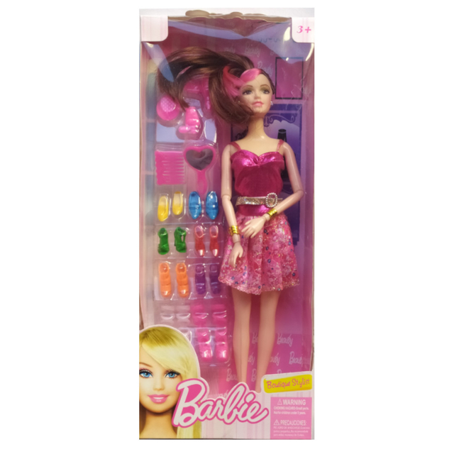 Muñeca articulada tipo Barbie con accesorios.