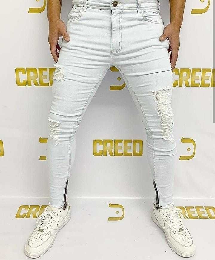 calça jeans skinny destroyed