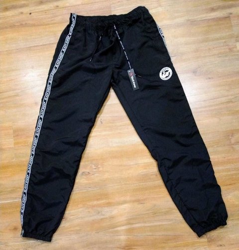 calça nike com elastico na barra