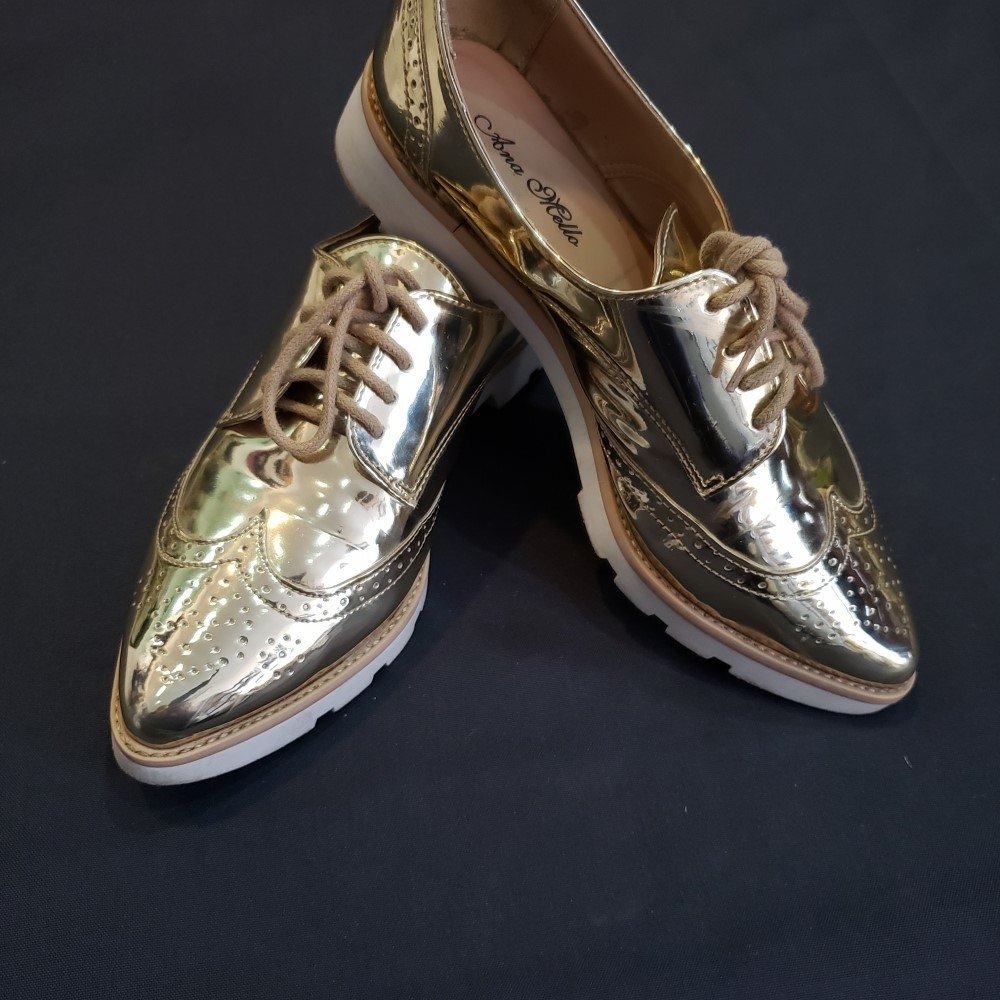 tenis dourado metalizado