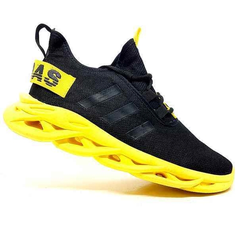 tênis masculino amarelo