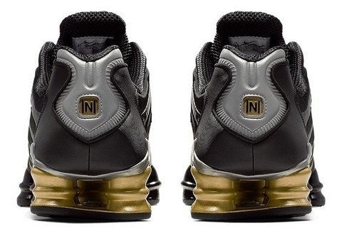 nike shox preto dourado