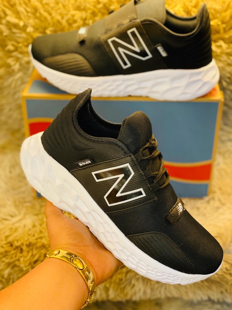 new balance 840 azul e laranja