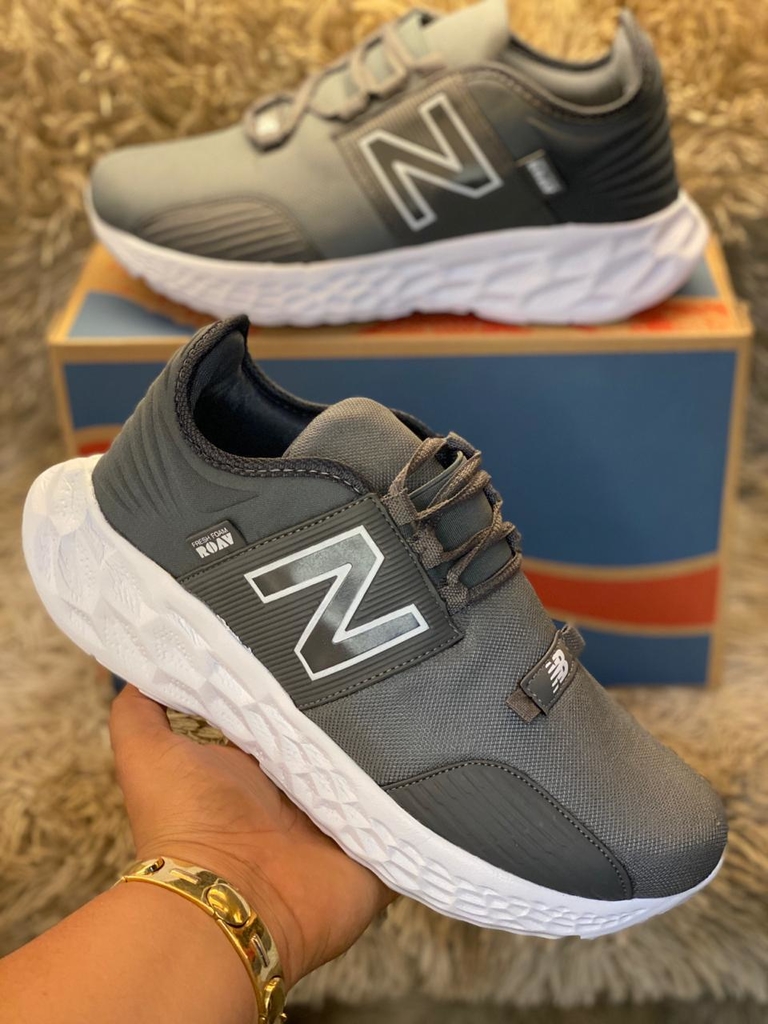 new balance 840 azul e laranja