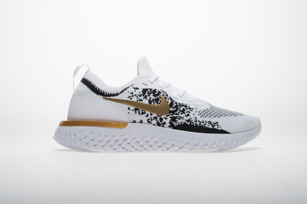 nike react dourado