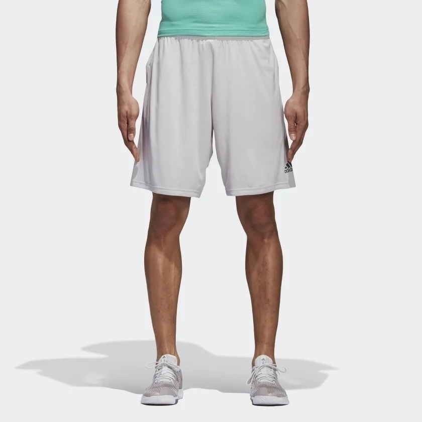 bermuda adidas com bolso de ziper