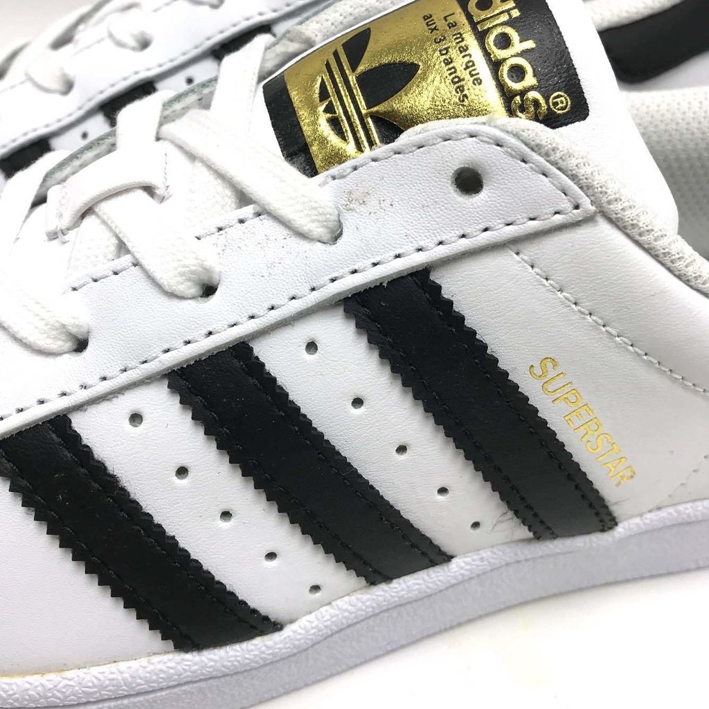 adidas com listra preta